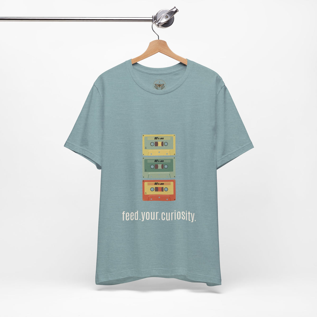 Feed Your Curiosity retro cassette tape graphic T-shirt — product view 1
