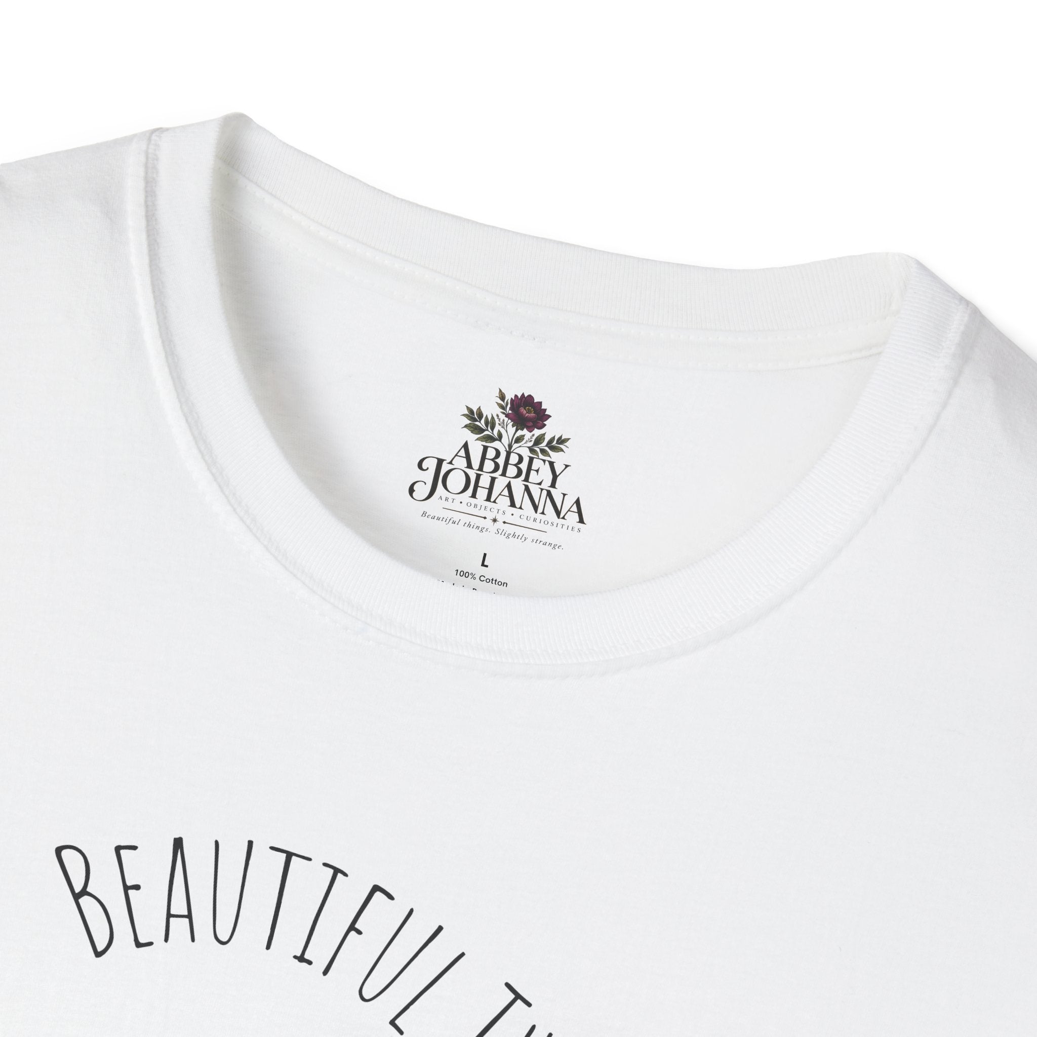 Beautiful Things Are Slightly Strange — Unisex Graphic Soft T-Shirt