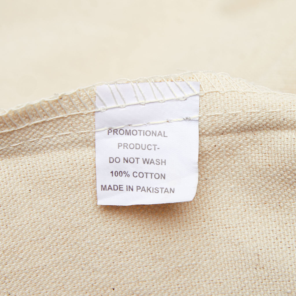 Vintage crane canvas tote with traditional tattoo-inspired bird and sun artwork — product view 9